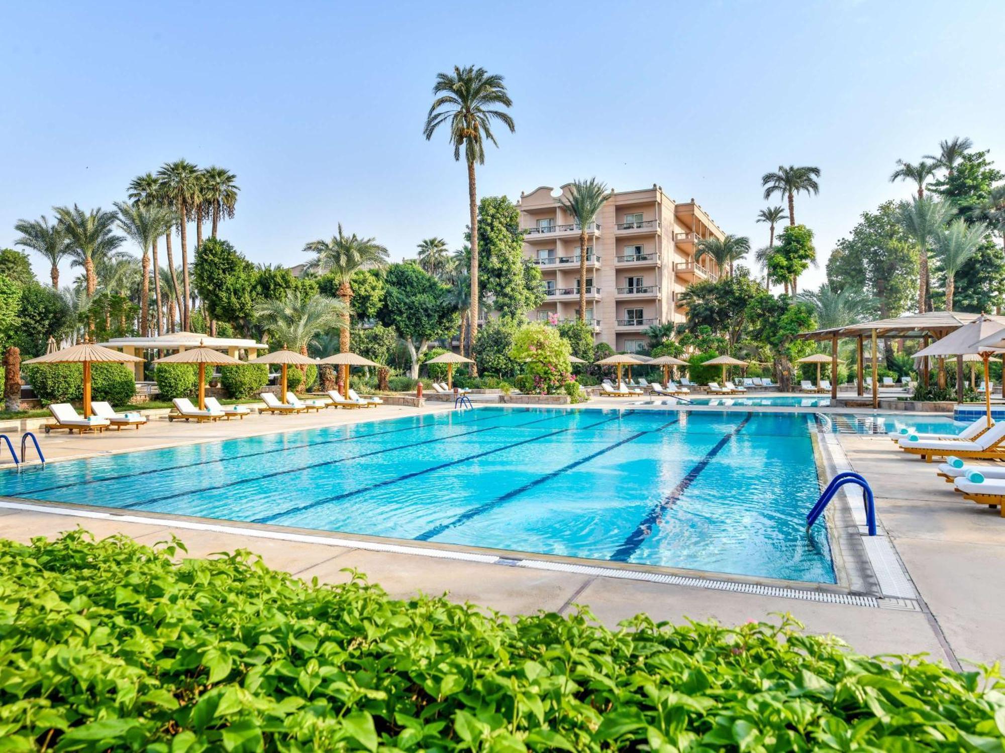 พาวิเลียน วินเทอร์ ลักซอร์ Hotel ภายนอก รูปภาพ The swimming pool at the Four Seasons Hotel, Cairo at Nile Plaza